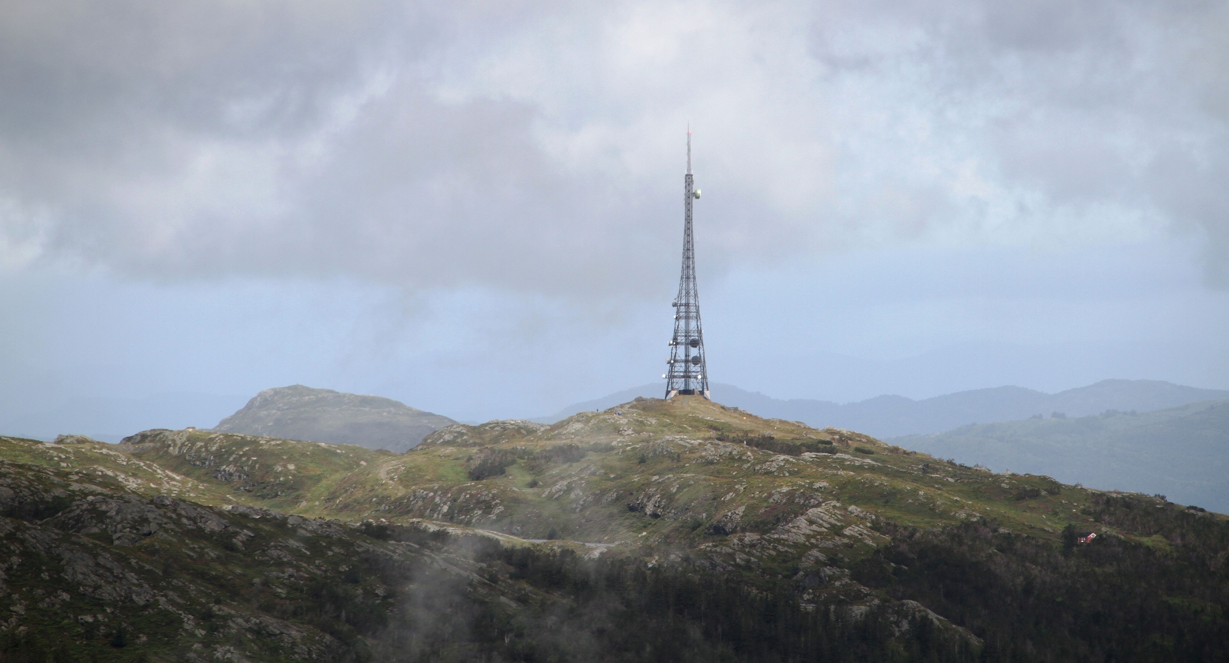 The radio Tower from 1912, ominating the "Rundemannen" mountin top (Bergen, Norway). The Tower is a listed Heritage site, and it also belongs to the Telenor Heritage Sites (Telenors verneplan).By Bjoertvedt (Own work) [CC BY-SA 4.0 (http://creativecommons.org/licenses/by-sa/4.0)], via Wikimedia Commons